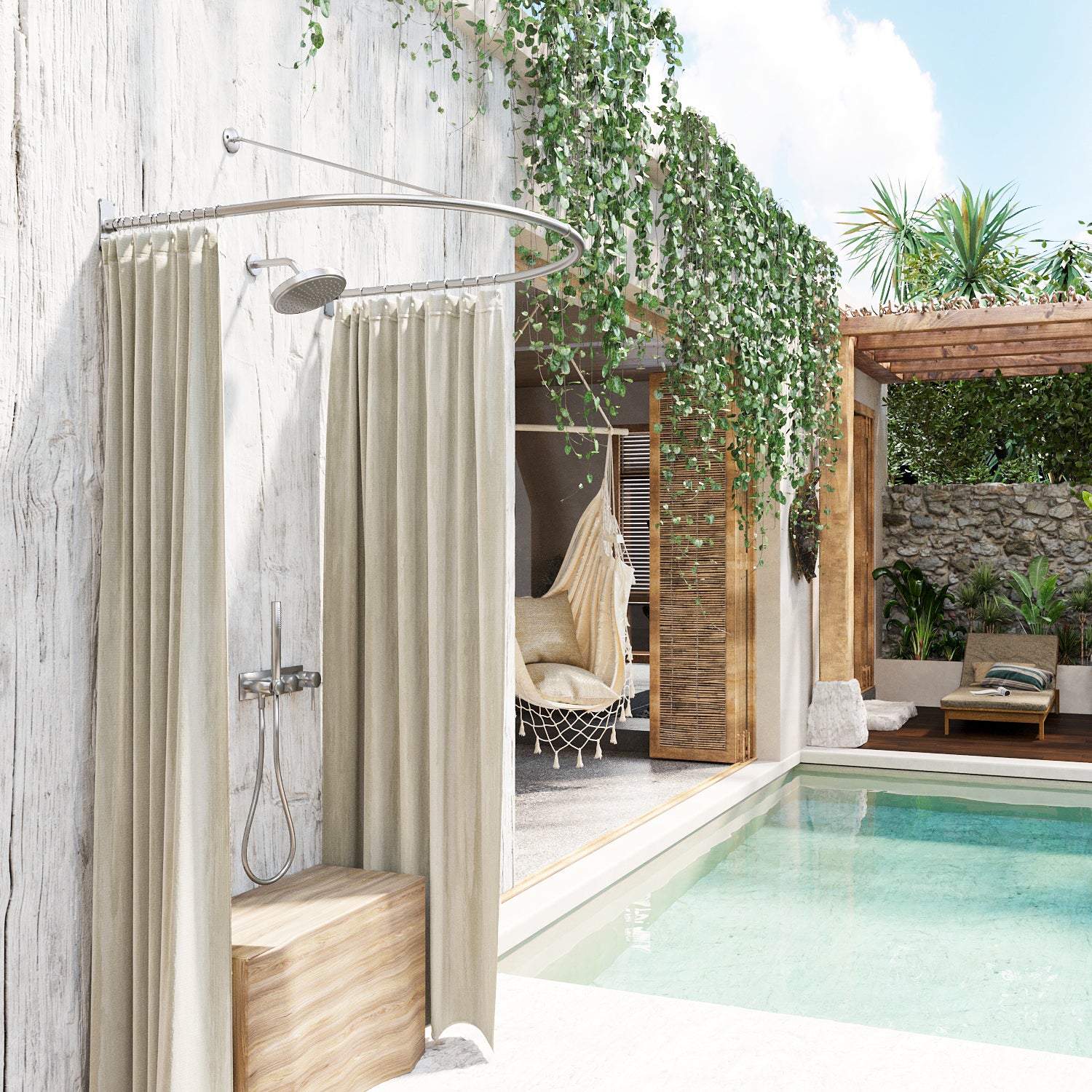 Half-oval outdoor shower curtain rod in brushed nickel with curtain next to a pool and lounge area